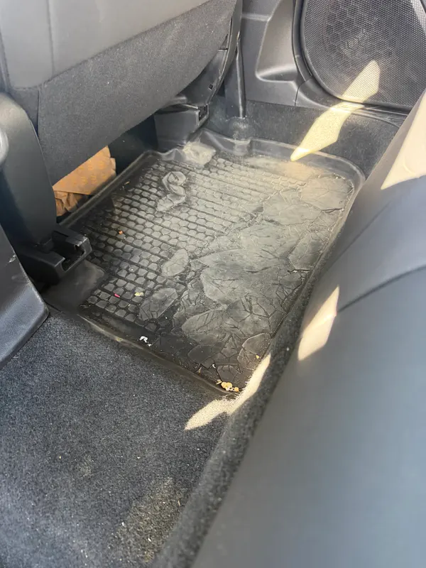 Subaru floor mat before detailing